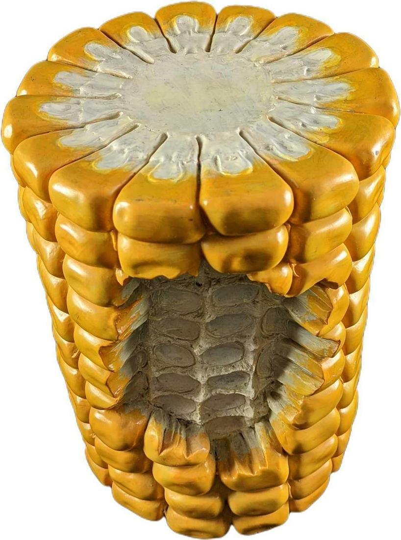 Rotary Hero Giant Corn On The Cob Stool: Pop a squat on this oversized corn-cob-shaped stool by Rotary Hero, produced by Third Drawer Down. Shaped like large corn of the cob with a bite taken out of, made from hand-painted resin for a kitsch