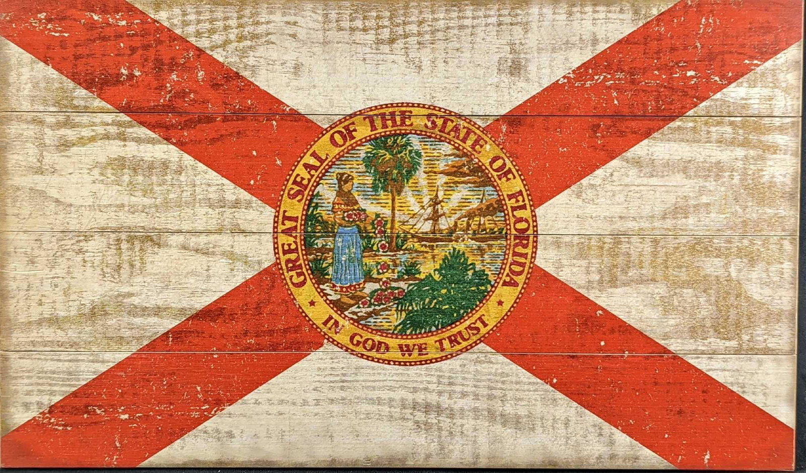Rustic Florida Flag Print On Wood: Florida Flag Print On Wood. The maker and date of creation are unknown. The actual "wear" is part of the image and not really worn. The flag print is approx 30" x 3/4" x 18" and it weighs 6lbs.