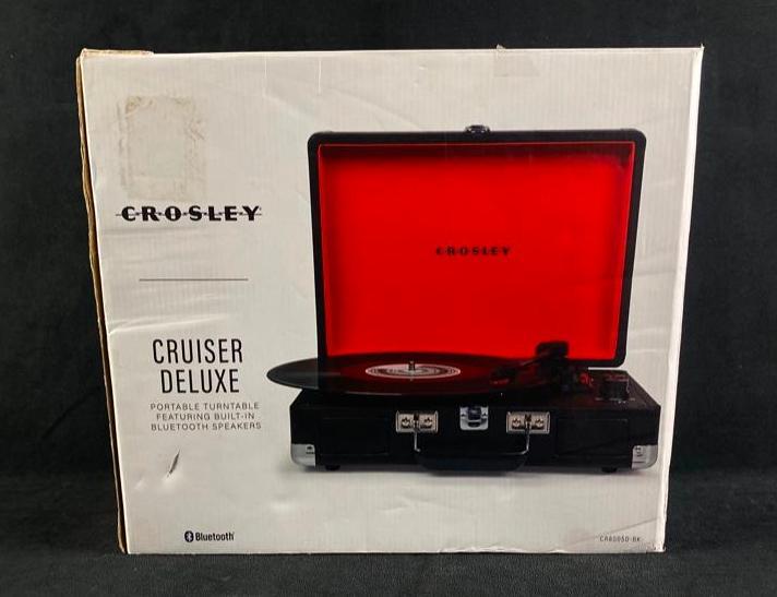 Brand New Crosley Portable Record Player: Brand New Crosley Portable Record Player Crosley Cruiser Deluxe portable record player, brand new in the box. Box has been opened but player has never been used. Plays both 33 1/3 and 45 rpm vinyl, an