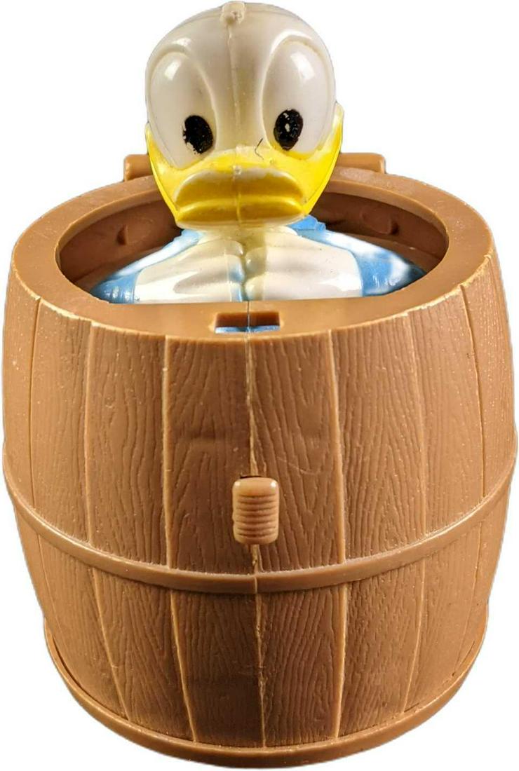 Vintage Walt Disney Donald Duck Pop Pal Kohner Bros: Push the button on the front of the barrel and the lid will pop over to reveal Donald Duck! Donald will make a cute squeak noise when he pops out. The barrel is approx 2 3/4" x 3" x 2 3/4" and it weig