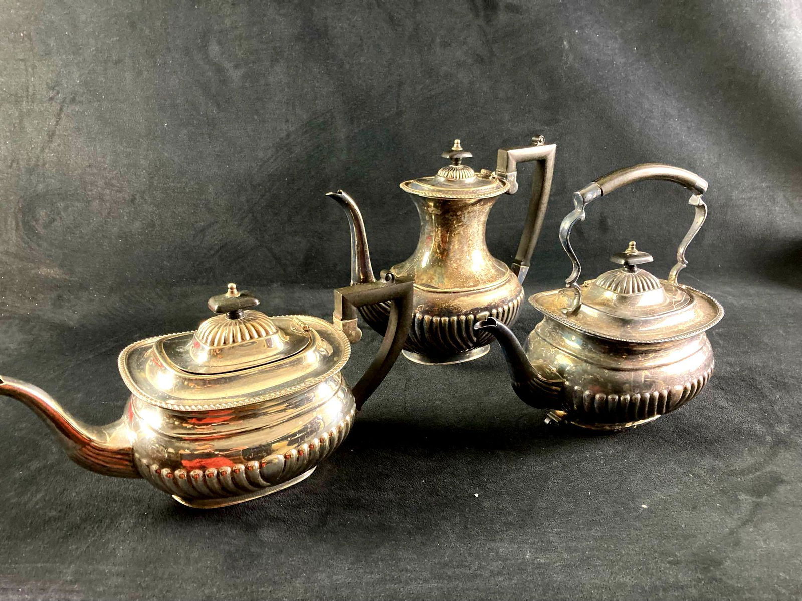 3 Silver Plate Coffee And Tea Pots: This lot includes: (3) Silver Plate Tea Pots & Coffee Pots. Condition is used and refer to photographs for additional details. One of the teapots is a Sheffield 1902 Tea Pot. The dimensions are 6.5" x