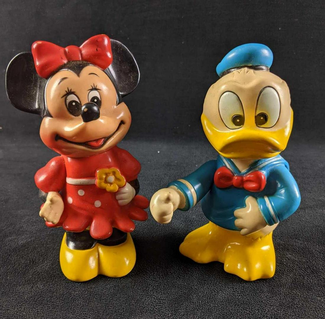 Walt Disney Donald Duck and Minnie Mouse Coin Banks: Walt Disney Donald Duck and Minnie Mouse Coin Banks These are vintage Donald and Minnie coin banks. These are old and pretty rare now a days. These are made from plastic but in good condition besides 