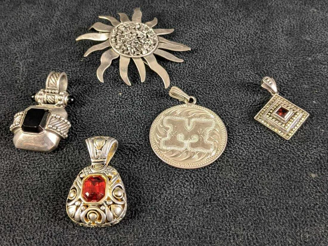 Assorted Charms and Sun Pin: Assorted Charms and Sun Pin These charms are great for making a piece of jewelry your own. These are in good condition with loops to put on any necklace or bracelet you like.