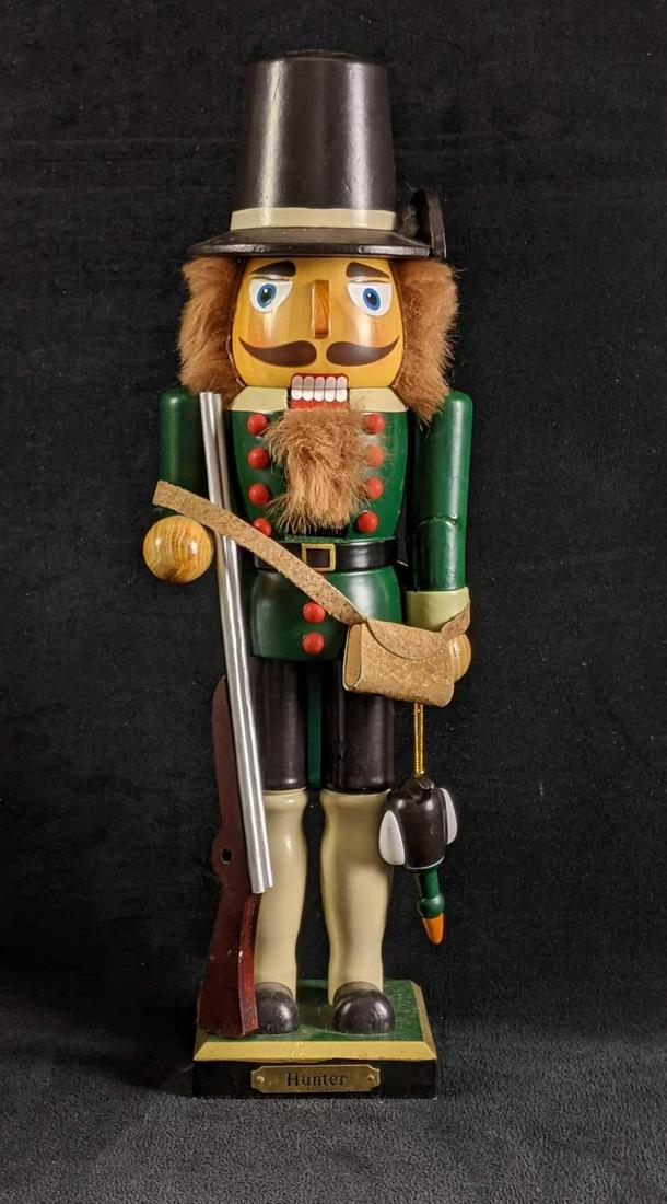 Hunter Nutcracker Christmas Decoration Nutcracker: Hunter Nut Cracker Christmas Decoration Nut Cracker This nutcracker is dressed as a Hunter with a rifle and fresh catch in hand. There is a plaque by the feet of the nutcracker that says "Hunter". It 