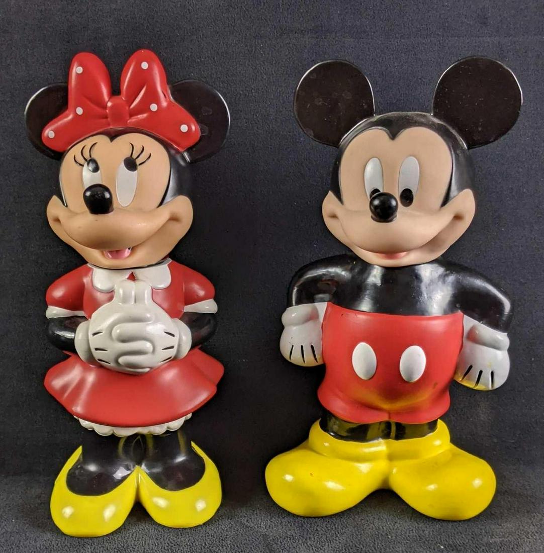 Disney Mickey and Minnie Mouse Drink Cups: Disney Mickey and Minnie Mouse Drink Cups These are Mickey and Minnie drink cups that unscrew to put beverages in and have a straw-sized hole at the top for a straw. These are in good condition with n