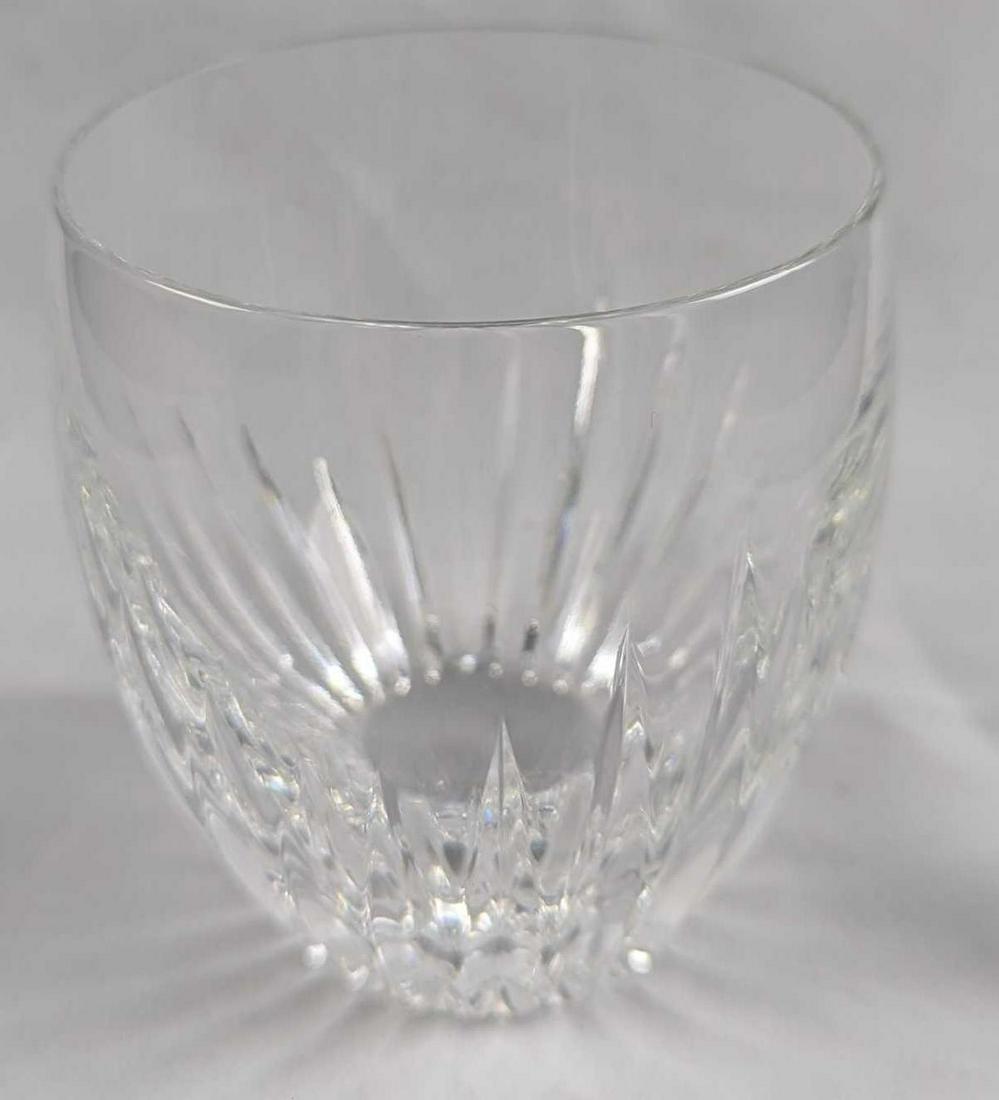 Baccarat Crystal Massena Tumbler: Deep orgue bevel cuts, irradiating from the base, are etched directly into the Clear crystal. The intricate detailing gives the Massena tumbler a barrel-like appearance and a textural feel. This artfu