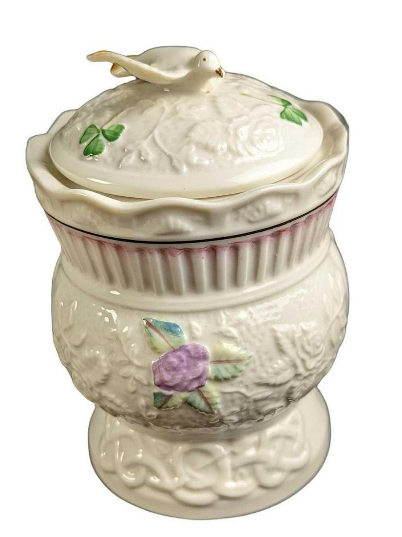 Belleek Fine China Songbird Gift Box: Belleek Fine China Songbird Gift Box. This was designed by Marie McGrellis and the "Gift Box" was released in 2007. Is approx 3" x 3" x 5". It also comes in its original box which is approx 6 1/2" x 6
