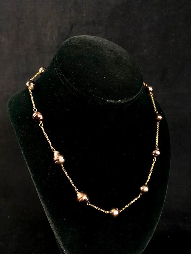 14k Gold Necklace w/ Tahitian Circle Pearls: 14k Gold Necklace w/ Tahitian Circle Pearls DETAILS: Metal - 14K Gold Color - Gold Tested - Yes Size - 18" Weight - 18 g total Markings - .585 Maker - unknown Stones - tahitian pearls Style - chain ne