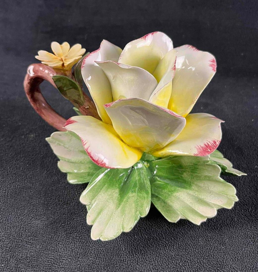 Vintage Capodimonte Yellow Rose Porcelain Sculpture: Vintage Capodimonte Yellow Rose Porcelain Sculpture Pictured is a lovely yellow rose made in Italy by Capodimonte. This sculpture is one of the companies vintage items that is a retired design. The fl