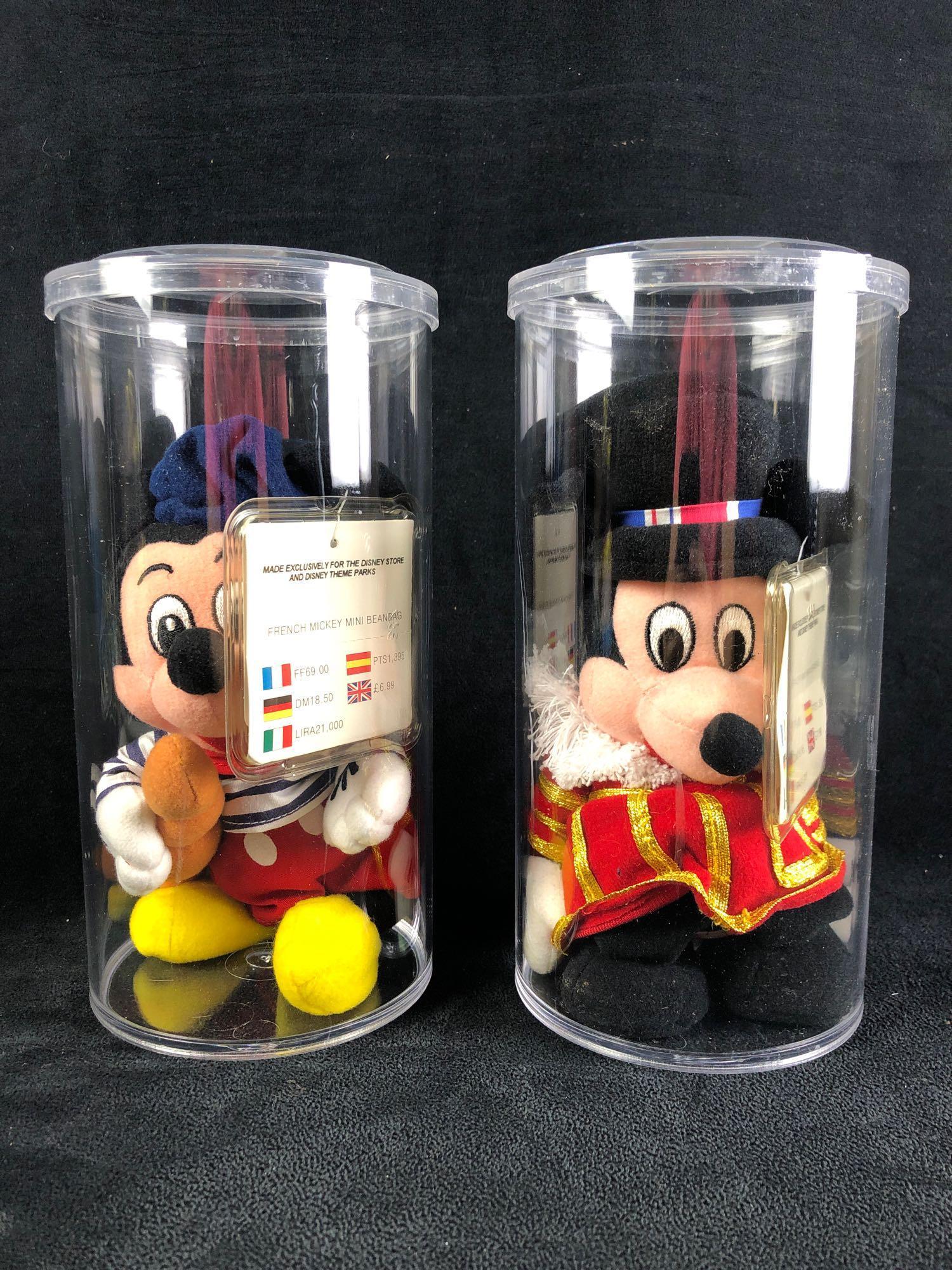 Disney European "French Mickey" and "Beefeater Mickey" Mouse Bean Bag Doll Set: Disney "French Mickey" Mouse and "Beefeater Mickey" Mouse bean bag doll set. Sold exclusively by Disney in Europe. This auction includes: (1) Disney "French Mickey" Mouse Bean Bag Doll (1) Disney "Bee