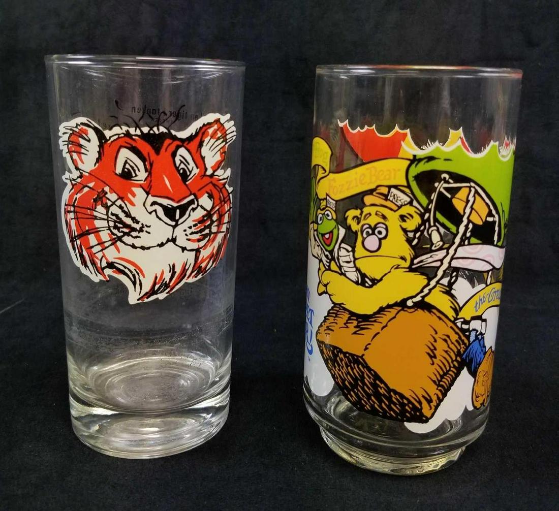 Set of 2 Nostalgic Cartoon Glasses: Set of 2 Nostalgic Cartoon Glasses. This set of glasses is in great used condition. The glasses need to be cleaned to remove dust/dirt, but otherwise they show no signs of damage. The two glasses incl