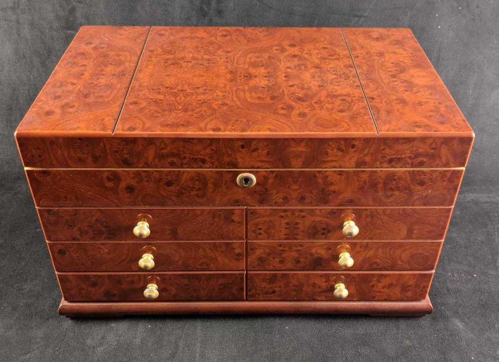 Cigar Humidor Wooden Humidor Box: This is a beautiful cigar humidor is lined with cider to keep moisture. This humidor has been used but is in good condition with some wear and scratches on the outer case. There are some markings and 
