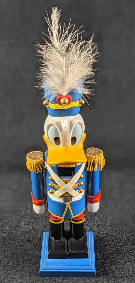 Rare Disney Donald Duck Nutcracker Decoration: Rare Disney Donald Duck Nutcracker Decoration. Made of resin and wood. Please note, this is for decoration only and not made to crack nuts! The nutcracker is approx 3" x 3" x 13" and it weighs under o