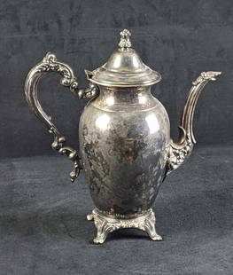 Oneida Silver Plated Teapot: Oneida Silver Plated Teapot This beautiful teapot is silver plated Oneida teapot. It has a fancy handle and spout. It is tarnished but in otherwise good condition. Clean this cutie up and serve tea