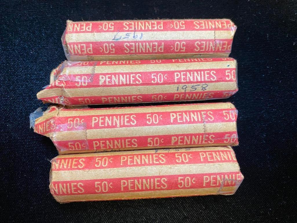 4 Rolls of Wheat Pennies: 4 Rolls of Wheat Pennies Wheat pennies in four rolls, two are open on one end. Each roll has approximately 50 pennies. Pennies are in different conditions and with different mint marks, most are from