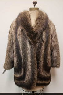 Genuine G and M Italian Raccoon Fur Coat: Genuine G and M Italian Raccoon Fur Coat. This fur coat is in great used condition. There is no known damage to the interior or exterior of the coat. The coat has a black fabric interior lining and