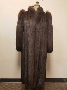 Full Length Mink with Fox Trim And SHoulders Fur Coat: This full length mink with fox trim and shoulders fur coat is in excellent used condition with no known damages. This coat features taupe linen interior with 2 outside concealed pockets with 3 hook