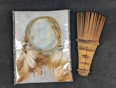 Native Hair Comb and Dream Catcher: Native Hair Comb and Dream Catcher This lot comes with two native trinkets. One is a new dream catcher still sealed and the other is a handmade comb. These items are in good condition. approx 9in x