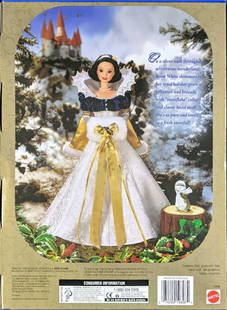 Mattel Disneys Snow White Holiday Princess Barbie B: Third in a series - Snow White Holiday Princess. Includes: doll, gown with cape, hand muff, hair accessory, shoes, and a Bunny ornament Was released in 1998. Comes in its original box which is