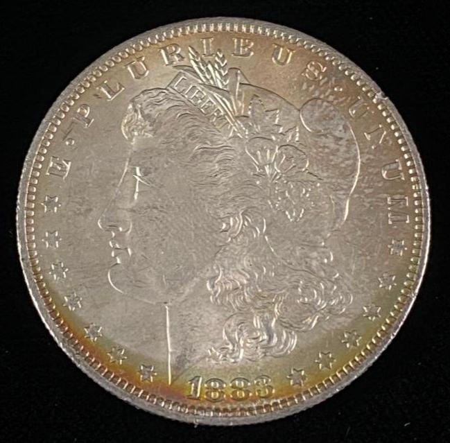 Toned 1883 Morgan Silver Dollar (1 of 3)