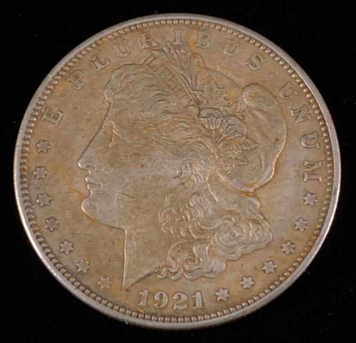 Toned 1921 Morgan Silver Dollar (1 of 3)