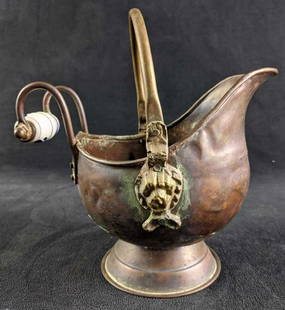 Brass/Copper Handmade Coal Scuttle: Brass Handmade Coal Scuttle With Delft Handle This is a hand-soldered coal scuttle with a ceramic delft handle decoration. This is in vintage condition with s small dent and tarnish but it is still a