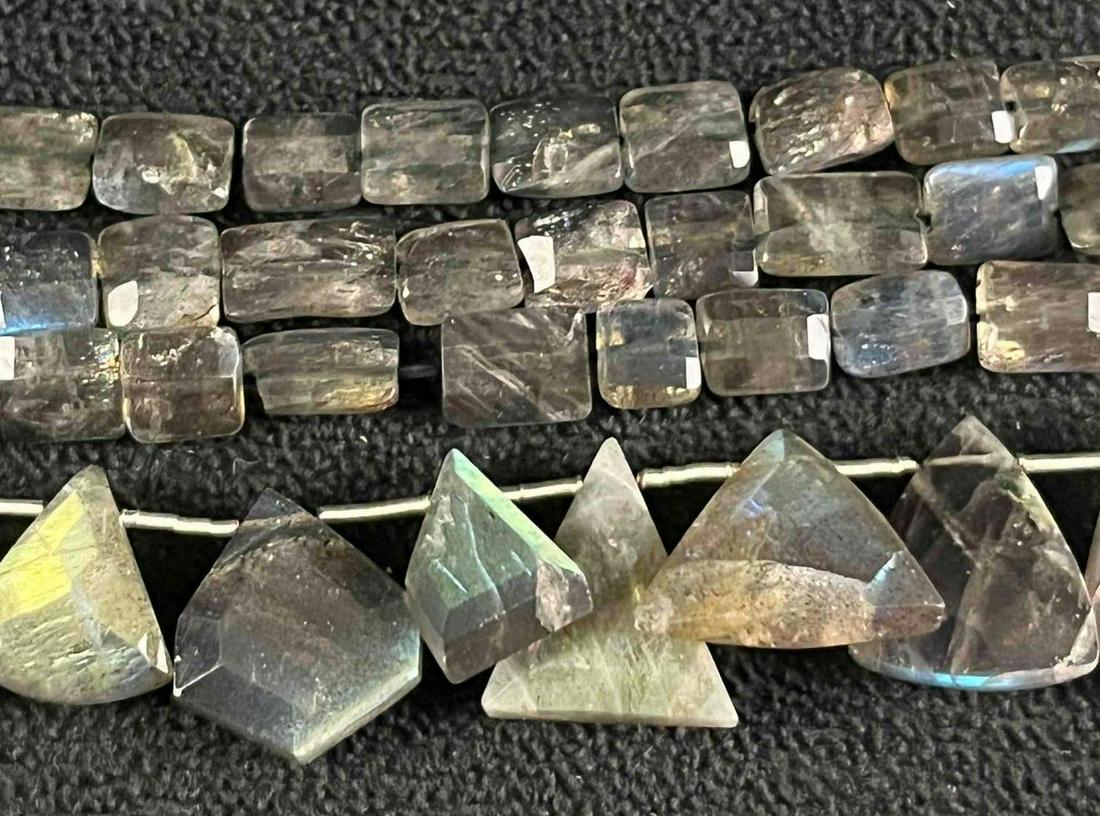 Labradorite Faceted Geometric Shape Beads: Labradorite Faceted Geometric Shape Beads Here is a lovely lot of labradorite beads for that jewelry artist out there. Also, a great set to purchase and have a jeweler design a one-of-a-kind piece. Th