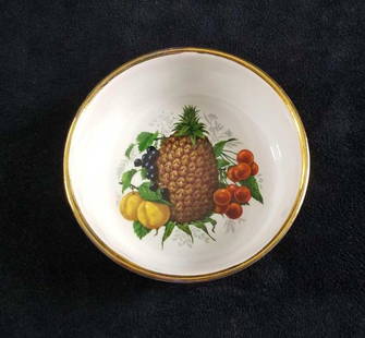 Darthmoth Elsenham Fruit Dessert Bowl England: The bowl is ceramic, white, with a pineapple and assorted fruit design on the center, and has gold gild. Made by Dartmouth Potteries in England specific for Elsenham Jam. Can be used as a fruit or