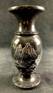 Stone Vase Etched Mountain Scene: This lot includes: (1) Stone Vase Etched Mountain Scene Condition is used and see photographs for additional details. The stone vase is light black in color and has an etched mountain scene with a