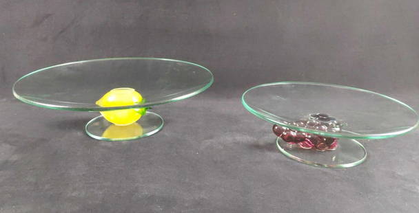 Vintage Glass Fruit Bowl Platters Lot Of Two: This lot includes: (1) One large lemon glass platter. Clear glass with a glass lemon underneath. Is approx 12 1/2" x 12 1/2" x 4". (1) One small grape platter. Clear glass with a glass grape