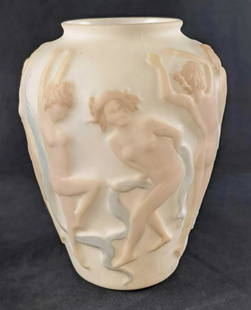 Vintage Dancing Nymphs Custard Uranium Glass Vase Pan: Custard/Uranium Glass "Pan" Vase. This vase features a group of blue scarf holding nude nymphs who dance to the music of Pan, who is also on this vase. The vase is approx 9" x 9" x 12" and is in a