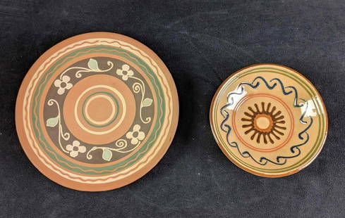 Decorative Spanish Pottery Plate and Bowl: Decorative Spanish Pottery Plate and Bowl These two items are beautifully hand-painted. The artist Jesus Parra signed their name on the back of the plate in the earthenware clay. The plate has a wire