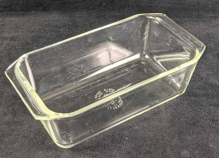 Pyrex 215-B Ovenware Clear Glass Loaf/Baking Dish: Pyrex 215-B Ovenware Clear Glass Loaf/baking Dish. Is approx 10 1/2" x 5 1/2" x 3 1/2 and weighs 2.11lbs. The baking dish is in a good, used condition with light wear and scratches.