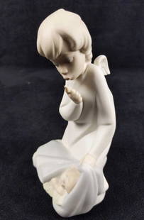 Lladro Angel Sleeping Baby Matte Finish Retired: Lladro Angel with Sleeping Baby #4635 â€“ Retired â€“ Porcelain figurine with a soft matte finish. Is in good. used condition with some wearing and light marks. Is approx 4" x 4" x 7".