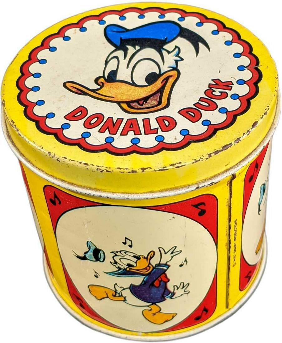 Vintage Disney Donald Duck Candy Tin: Vintage Disney Donald Duck Candy Tin. Is approx 3 1/2" x 3 1/2" x 3 1/2" and it weighs under one pound at 0.20lb. The tin is in a good, vintage condition with small dents and scratches. Please see the