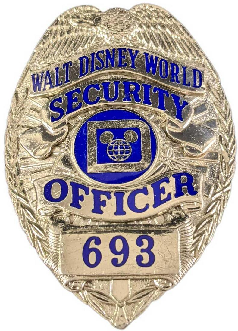 Early 1980s Disney World Security Metal Badge: Early 1980s Disney World Security Metal Badge. Is approx 2 1/4" x 3/4" x 3" and it weighs under one pound at 0.16lb. The metal badge is in a good, vintage condition with some wear and mini scratches a