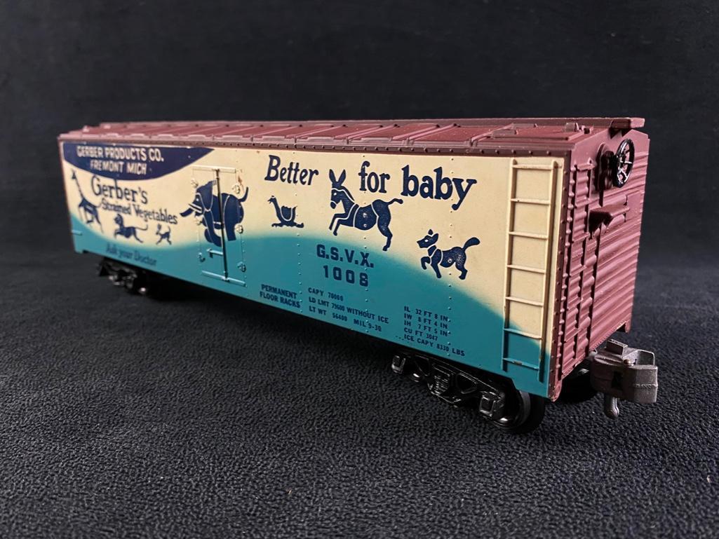 O Scale 36' Gerber Reefer Car GSVX 1008: O Scale 36' Gerber Reefer Car GSVX 1008 Gerber's Strained Vegetables refrigerated boxcar in O scale. In good condition, one small piece appears to have been repaired and there is an area on the top th