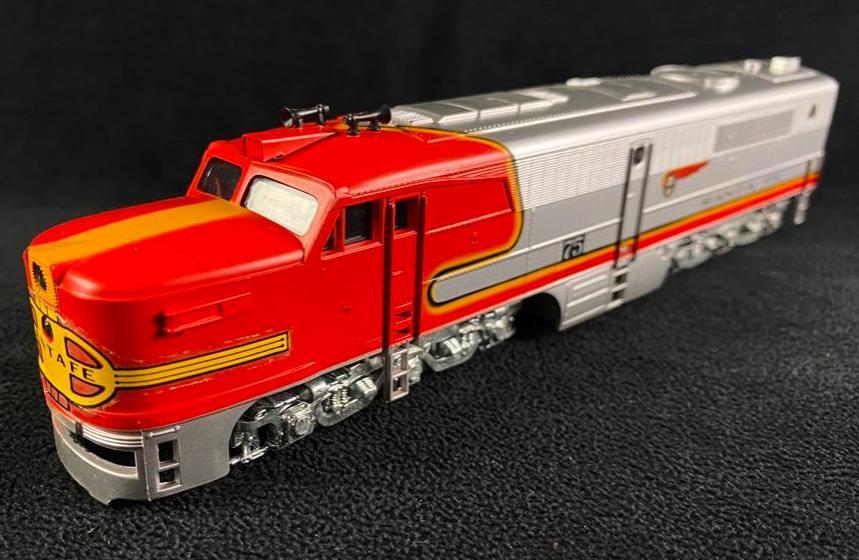 Vintage HO Scale ALCO PA-1 Powered Locomotive: Vintage HO Scale ALCO PA-1. This vintage train is still in the original box and is in great condition with no known damage. Tested and powers up when placed on live track. Approximate size: 10.75" x 3