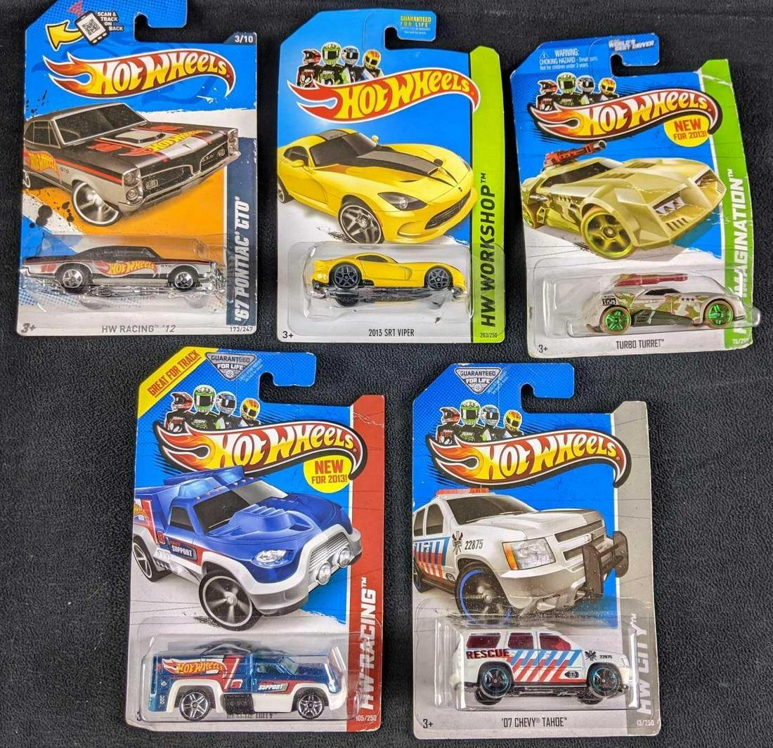 Five Assorted Hot Wheel Cars: Five Assorted Hot Wheel Cars All of the Hot Wheels in this lot are in their original boxes sealed. We have Wheels from 2012-2014 in this lot. The items are all in good condition with no known damage b