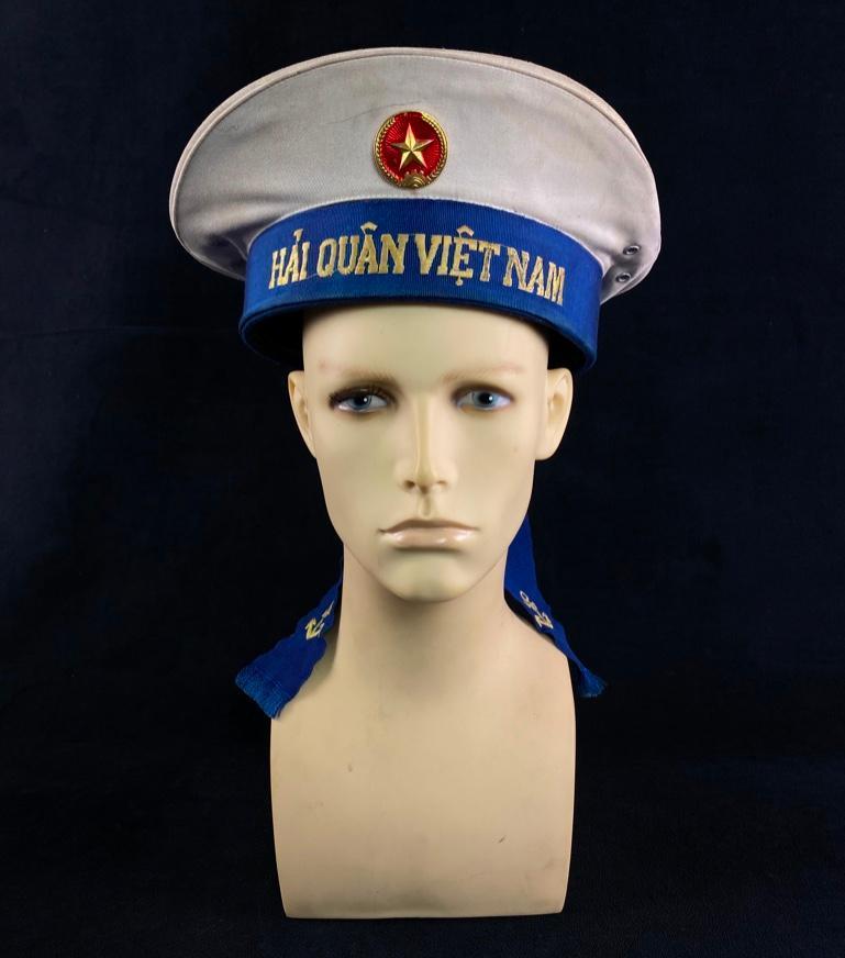 Vietnamese Sailor/Marine White Cap: Vietnamese Sailor/Marine White Cap White dress cap, from the Vietnamese Navy or Marines. Appears to be from the 1970s or 1980s, so most likely from the period just after the end of the Vietnam War. Ha