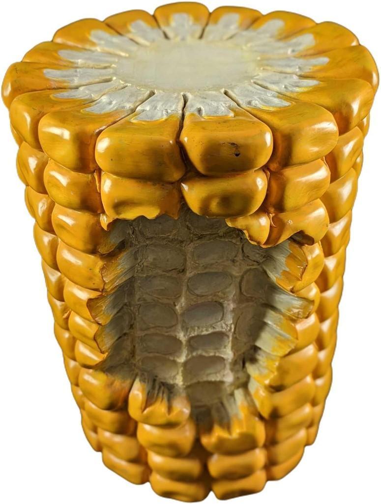 Rotary Hero Giant Corn On The Cob Stool: Pop a squat on this oversized corn-cob-shaped stool by Rotary Hero, produced by Third Drawer Down. Shaped like large corn on the cob with a bite taken out, made from hand-painted resin for a kitschy t