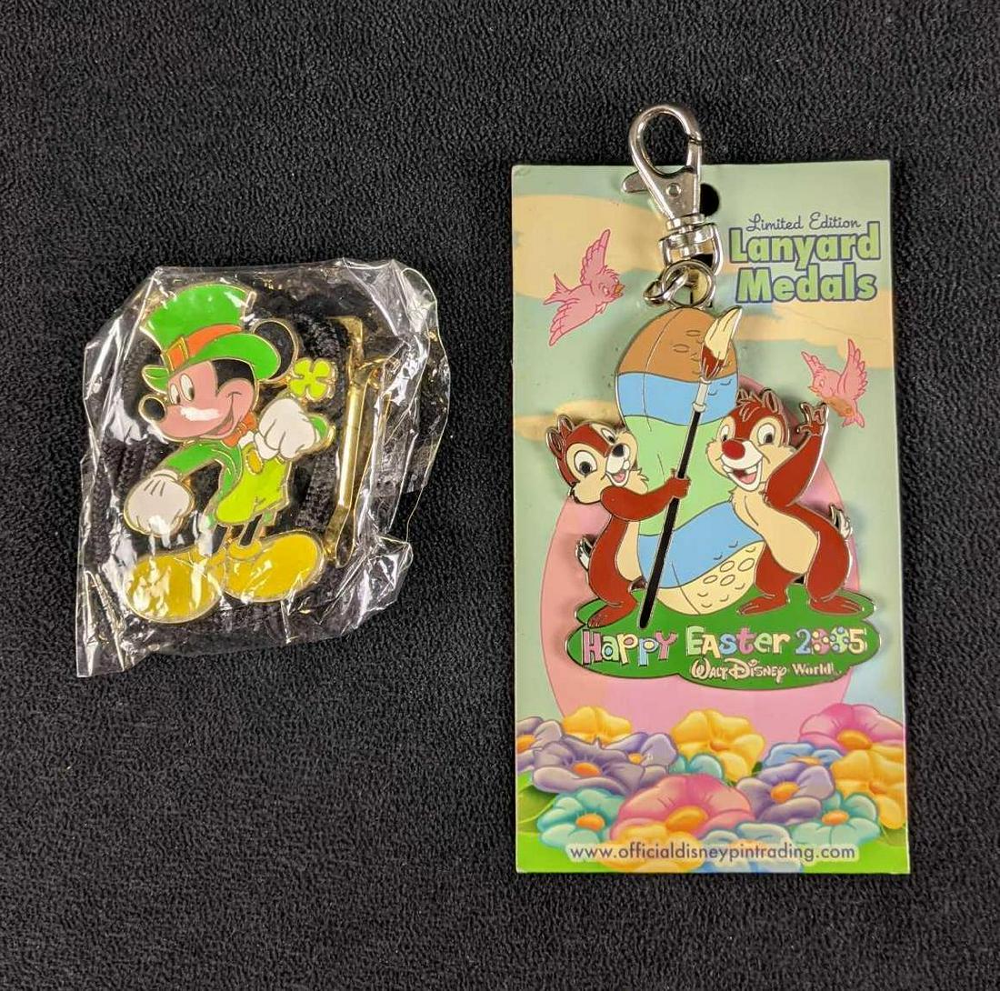 Walt Disney Lanyard Holiday Metals: Walt Disney Lanyard Holiday Metals Two Holiday metals in this lot Easter Metal with Chip and Dale St. Patrick Day Metal with Mickey Both are in or on their original packaging and in great shape.