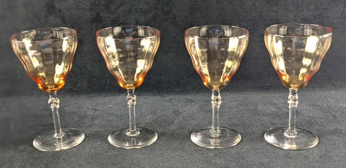 Four Vintage Glass Amber Bottomed Goblets: Four Vintage Glass Amber Bottomed Goblets. Maker and date is unknown. Each goblet is approx 3 1/4" x3 1/4" x 6" and together they weigh 1.30lb. The goblets are in a good, vintage condition with two ha