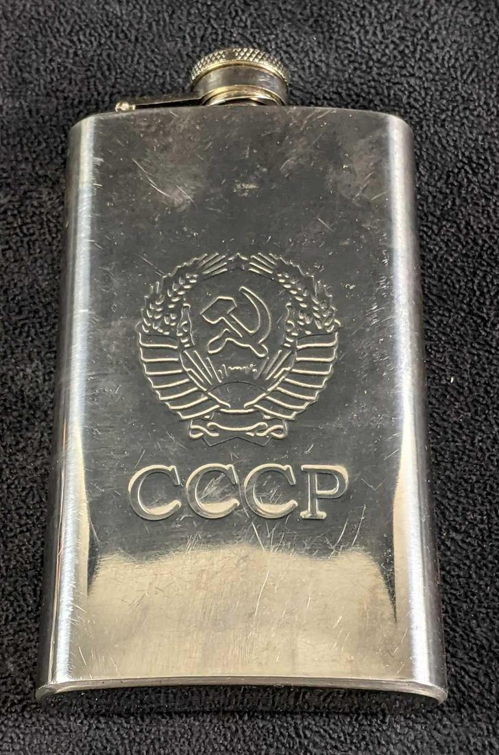Stainless Steel USSR CCCP Flask Reproduction: Stainless Steel USSR CCCP Flask Reproduction This is a neat CCCP reproduction flask made of stainless steel. The flask is in good condition with some scratching/scuffing but not major damage. CCCP sta