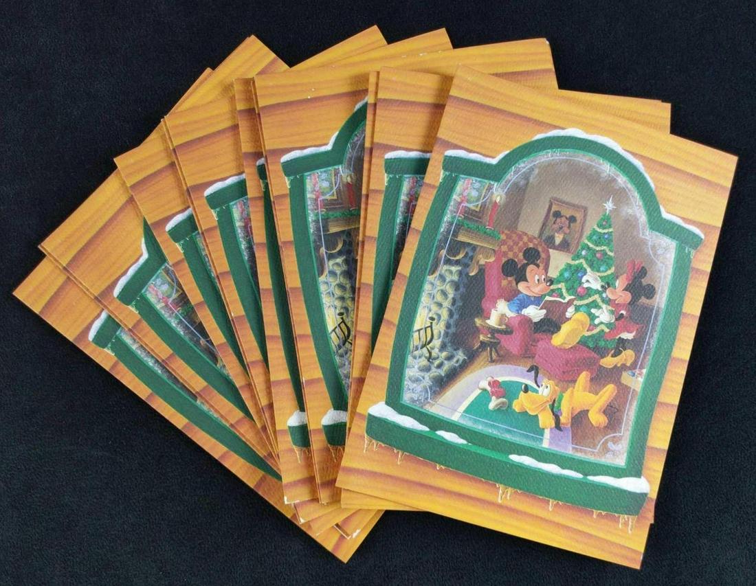 18 Disney Mickey Minnie Pluto Christmas Cards Holiday: Eighteen Disney Christmas Cards that show Mickey Mouse, Minnie Mouse and Pluto enjoying a day together. Minnie hangs ornaments, Mickey reads a book and Pluto admires a gift. Cards are approx 5" x 7".