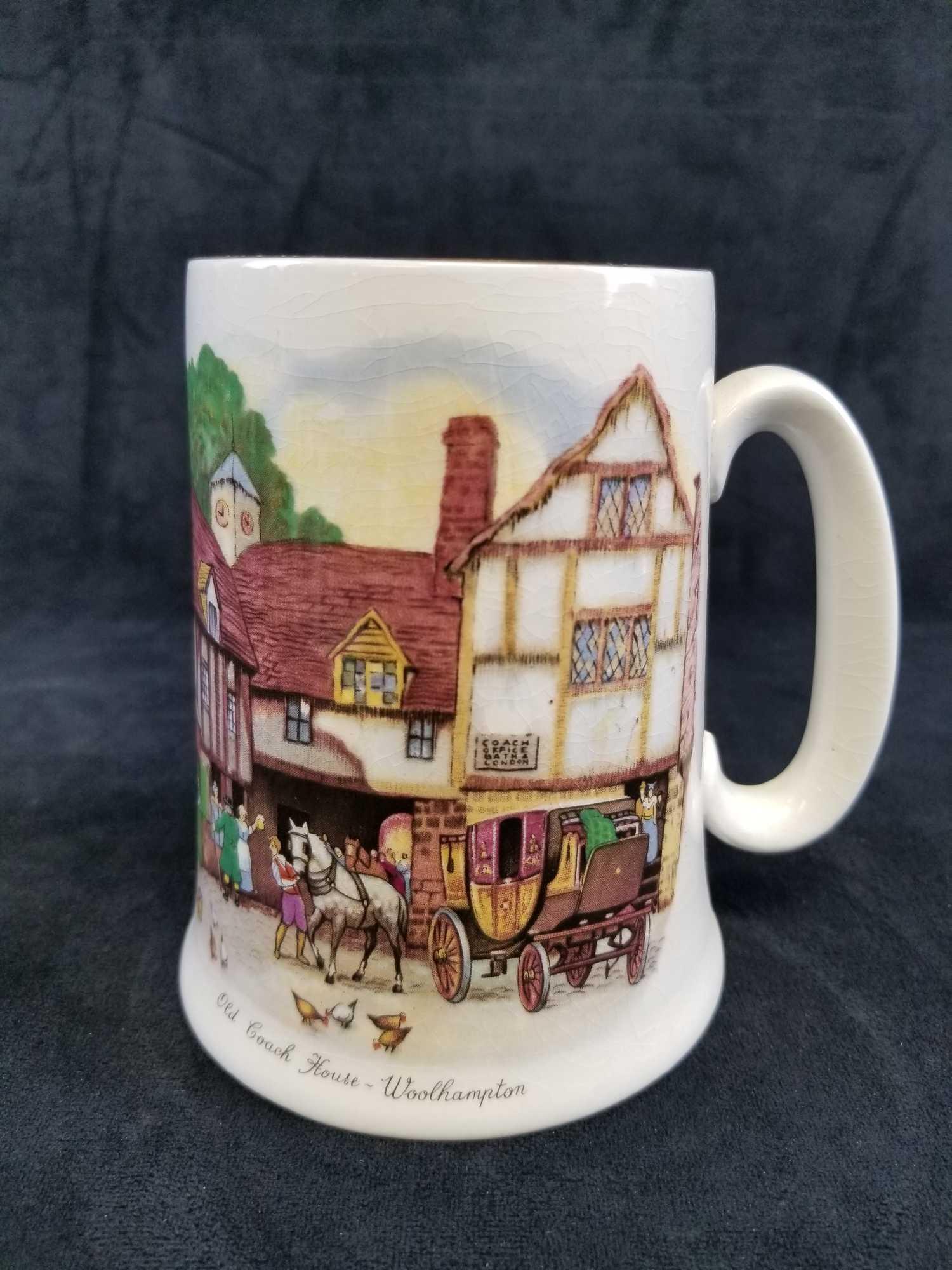 Vintage Old Coach House Woodhampton Beer Mug Stein: Beautiful detail to a little town in Woolhampton. Alpine White, English Ironstone with gold paint accents around the rim and handle. Some Expected crazing with age. No chips. Stands at about 5" inches
