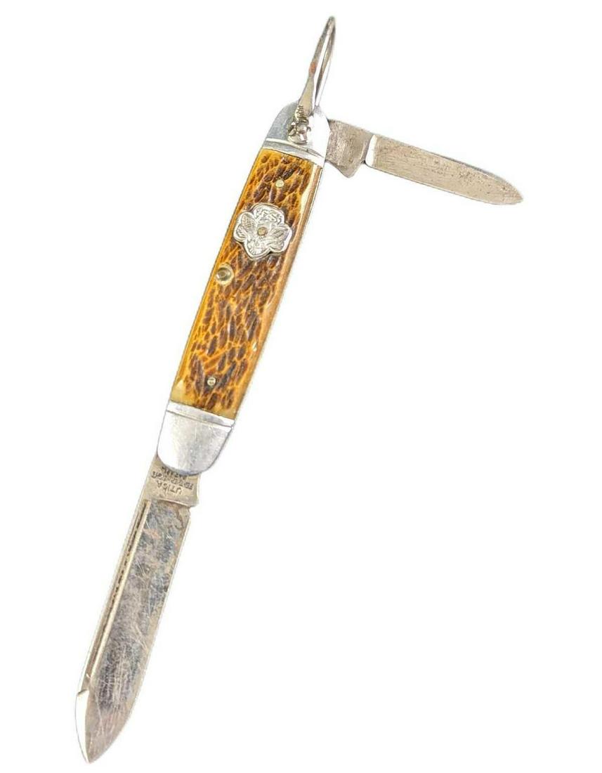 Vintage Girl Scout Knife UTICA 2-blade: Vintage Girl Scout Knife UTICA 2-blade pocket knife with bone handle.Is approx 1" x 3/4" x 3 1/2" and it weighs 0.07lb. Is in a good, vintage condition with some light surface rust and wear on the bon