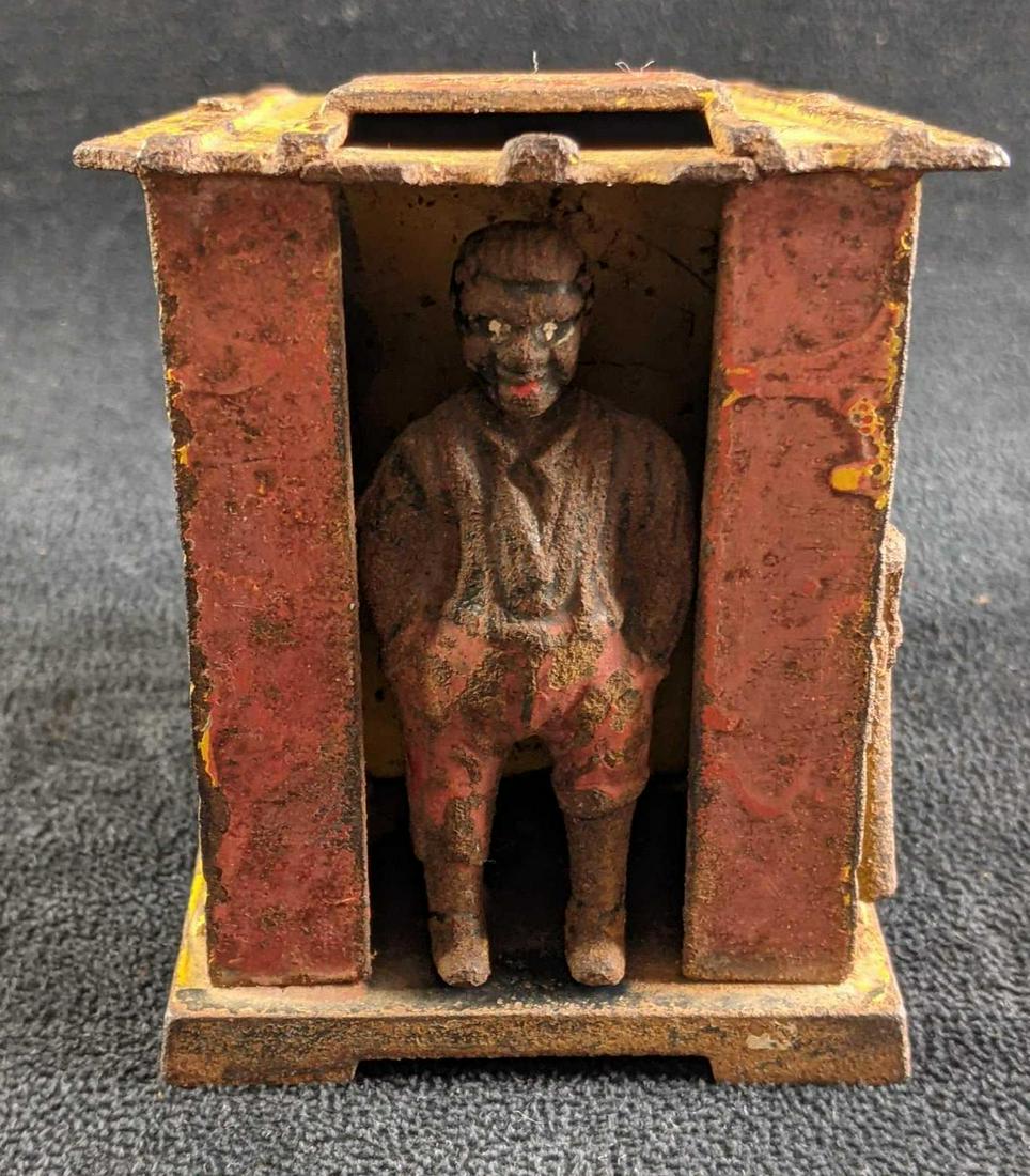 Original Black Americana Cabin Bank 1885: Original Black Americana Cabin Bank 1885 This is an original cast iron Mechanical Bank by J & E Stevens. This bank is in fair condition it has some surface rust and paint loss. the bank does not have 