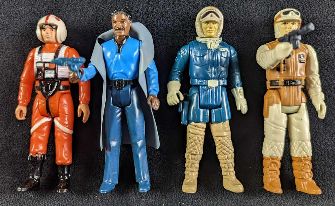 4 Vintage Star Wars Action Figures: This lot contains loose figures from Empire Strikes Back: (1) 1980 Lando Calrissian With Cape & Gun. (1) Hoth Rebel Soldier With Gun. (1) X-Wing Fighter Pilot. (1) Hoth Han Solo Each figure is approx