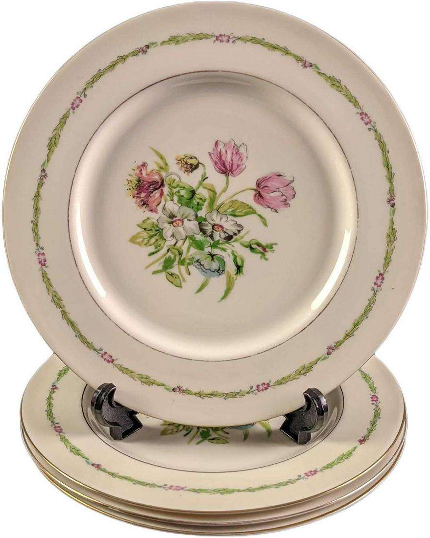 Four Vintage Retired Haviland Garden Flowers Plates: This series was released from 1945 - 1966. These dinner plates are approx 10" and together they weigh 4.47lbs. The plates are in a good, vintage condition with some wear on the trim and color and some